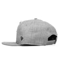 side of grey paper plane hat showing new era logo and backstrap