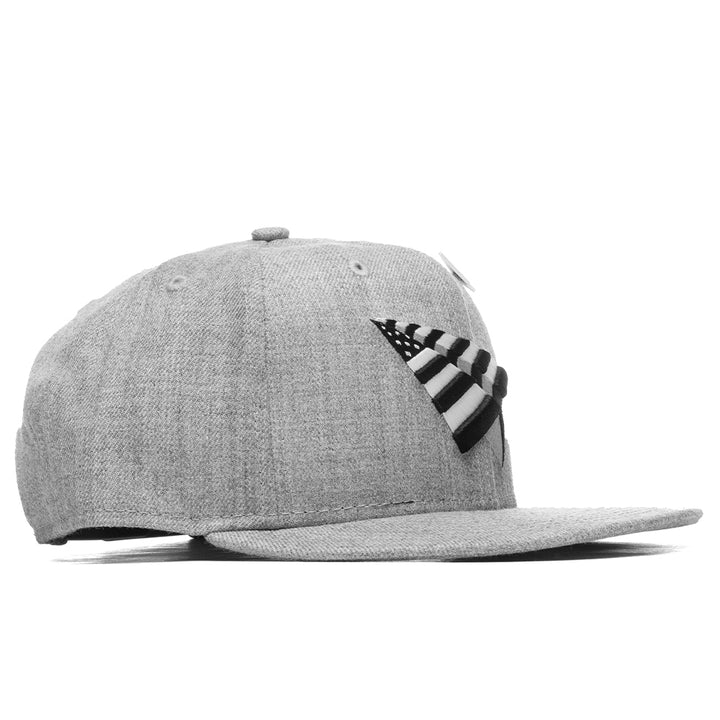 side profile of grey paper plane SnapBack showing the edge of the logo